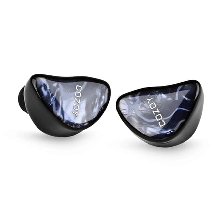 COZOY D2 earphones angled to show the black 3D-printed resin shells and marble faceplates