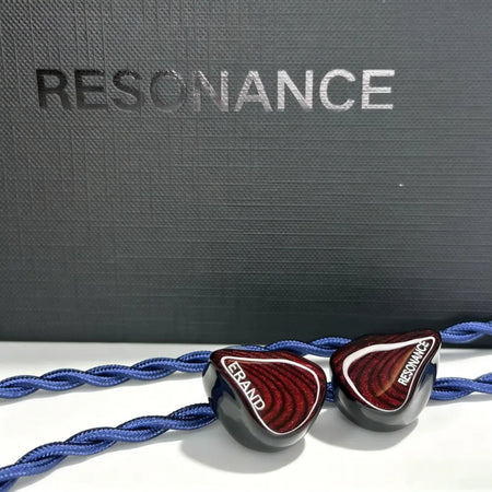 ERAND Resonance 5 Red earphones in front of the Resonance packaging box