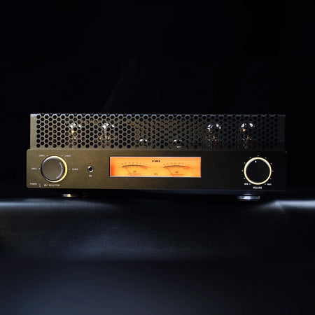 FiiO EA13 black tube amplifier with amber knob lighting and backlit VU meters