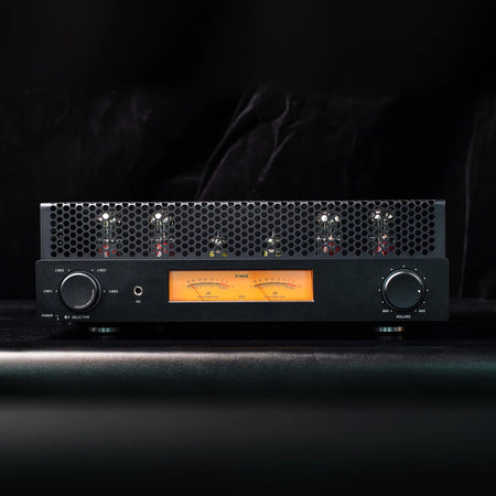 FiiO EA13 black tube amplifier front view with EL34 and PCF80 tubes glowing behind the grille