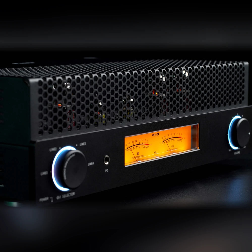 FiiO EA13 RGB knob lighting in blue beside the backlit mechanical VU meters
