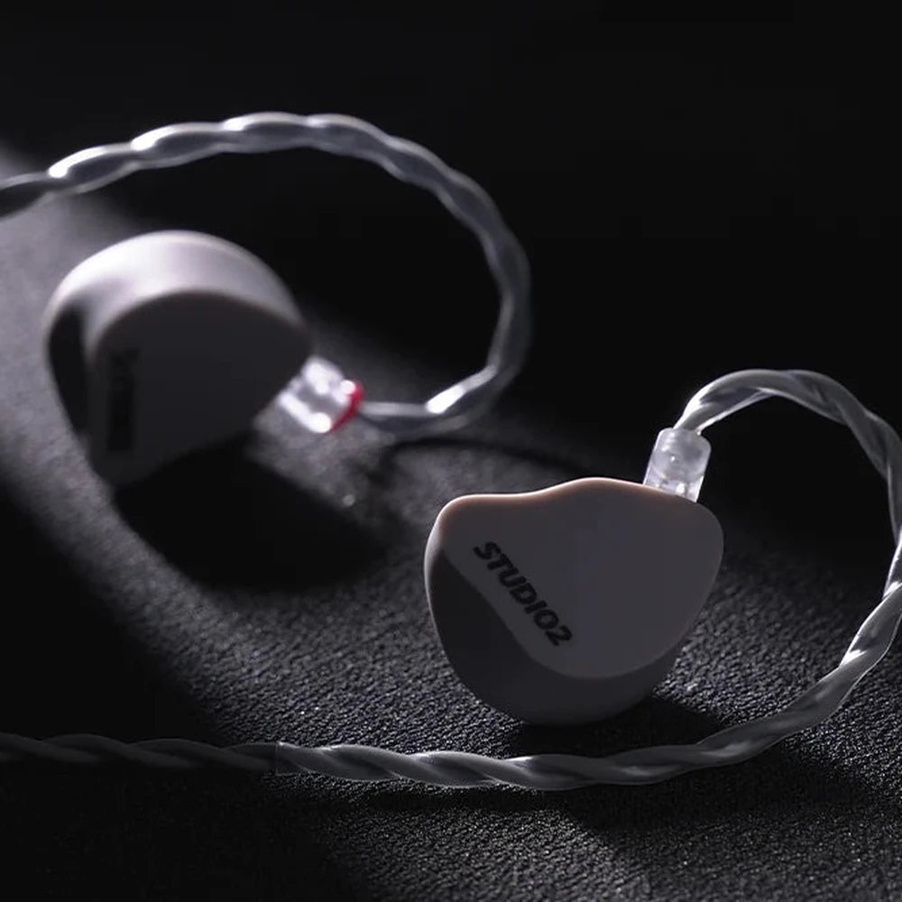 Softears Studio 2 earphone detail shot on dark surface