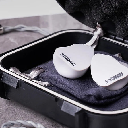 Softears Studio 2 earphones packed in their carrying case with accessories