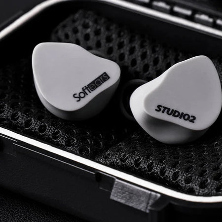 Softears Studio 2 earphones close-up inside carrying case foam insert