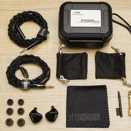 Softears Studio 4 accessories flat lay including cables, case and eartips