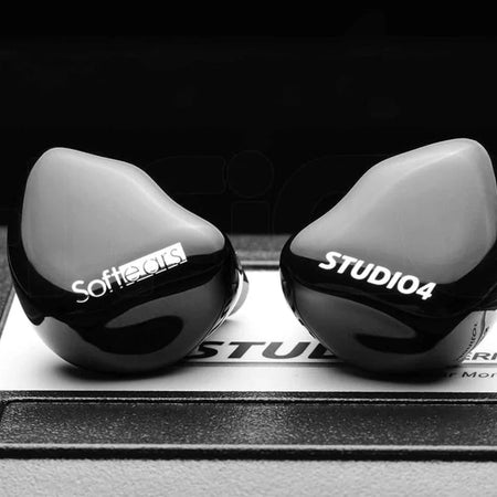 Softears Studio 4 earphones on their carrying case