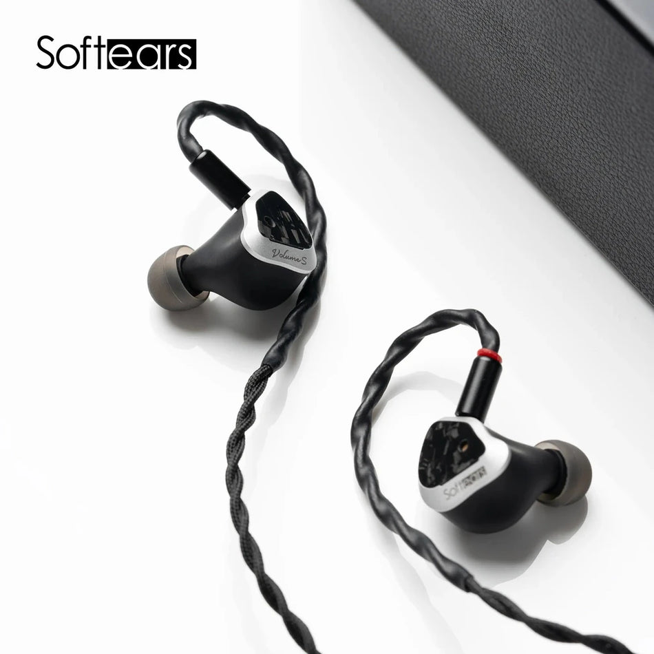 Softears Volume S earphones angled view beside their carrying case